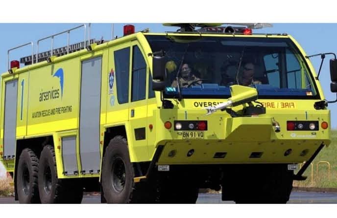 An aviation rescue and fire fighting tender on an airport apron.